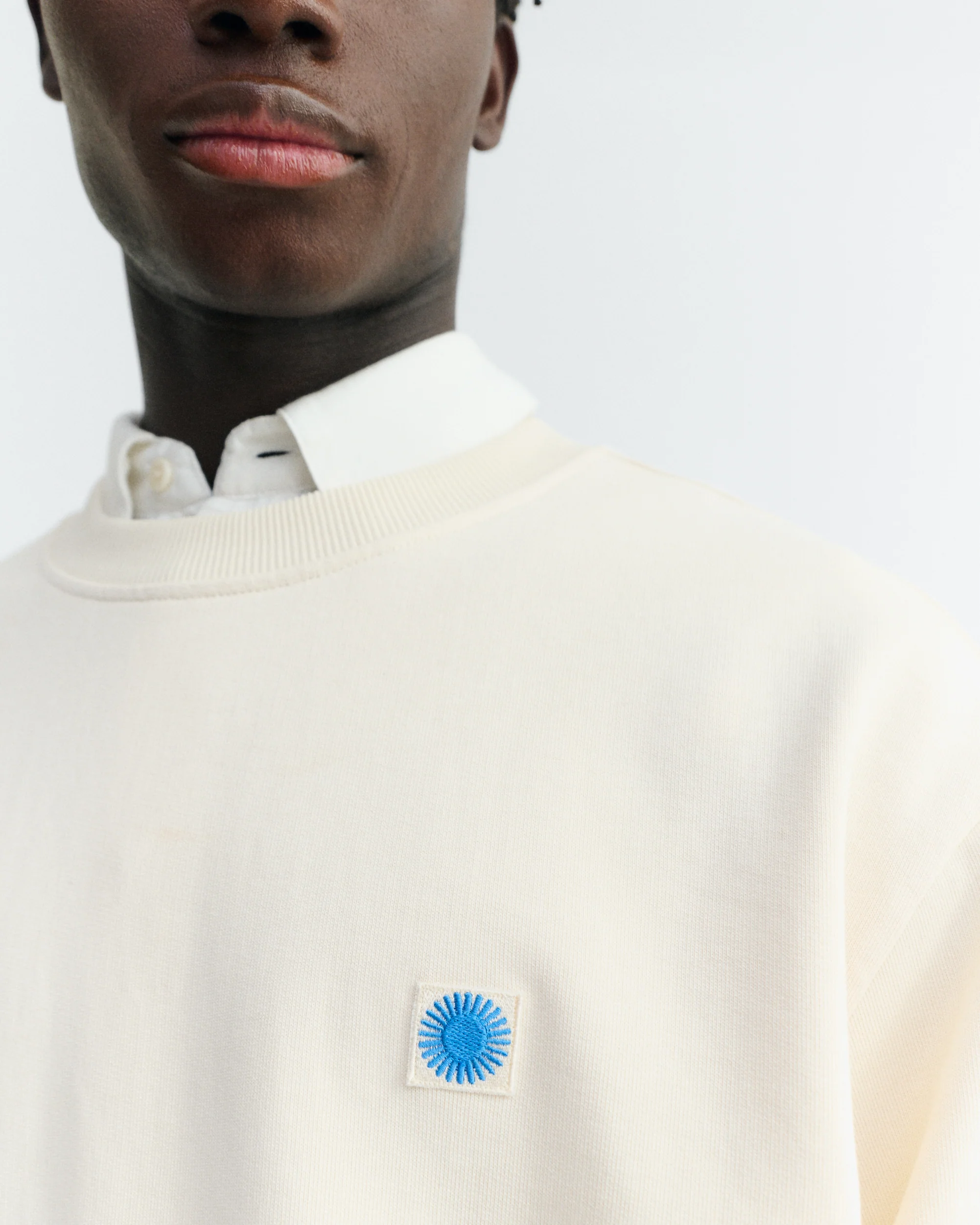 Sudadera cruda sol azul espalda Leon - Image 5